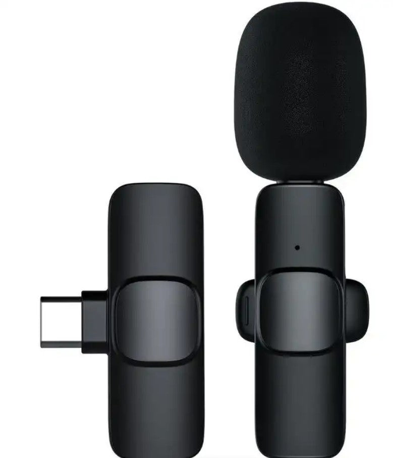 Black microphone with USB connector on a white background